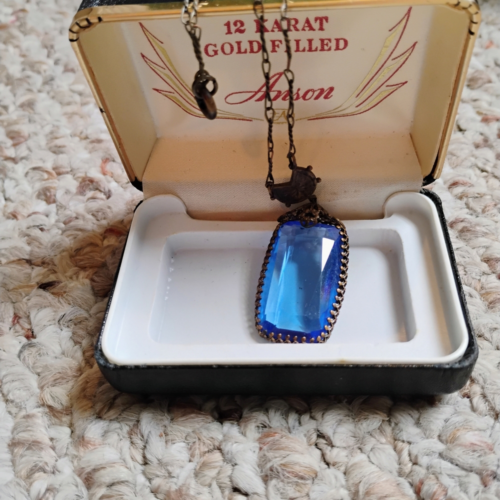Elegant “Mid-century Anson,” “Gold-filled vintage necklace,” “Faceted blue stone